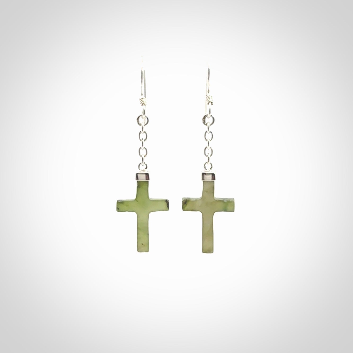 Hand carved small Nephrite jade cross earrings. Made by NZ Pacific from real jade. Online jewellery for sale online by NZ Pacific.