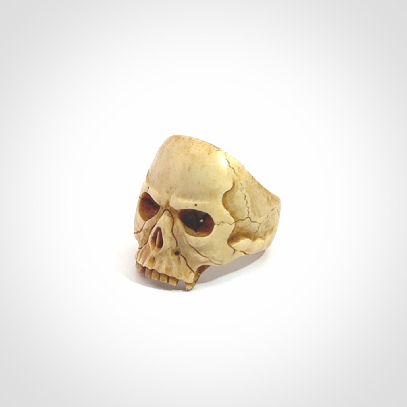 Hand carved skull ring. Made from Red Deer antler in New Zealand. Unique skull ring hand made from deer antler by master bone carver Fumio Noguchi. Spectacular collectable work of art, made to wear. One only ring, delivered to you at no extra cost with express courier.