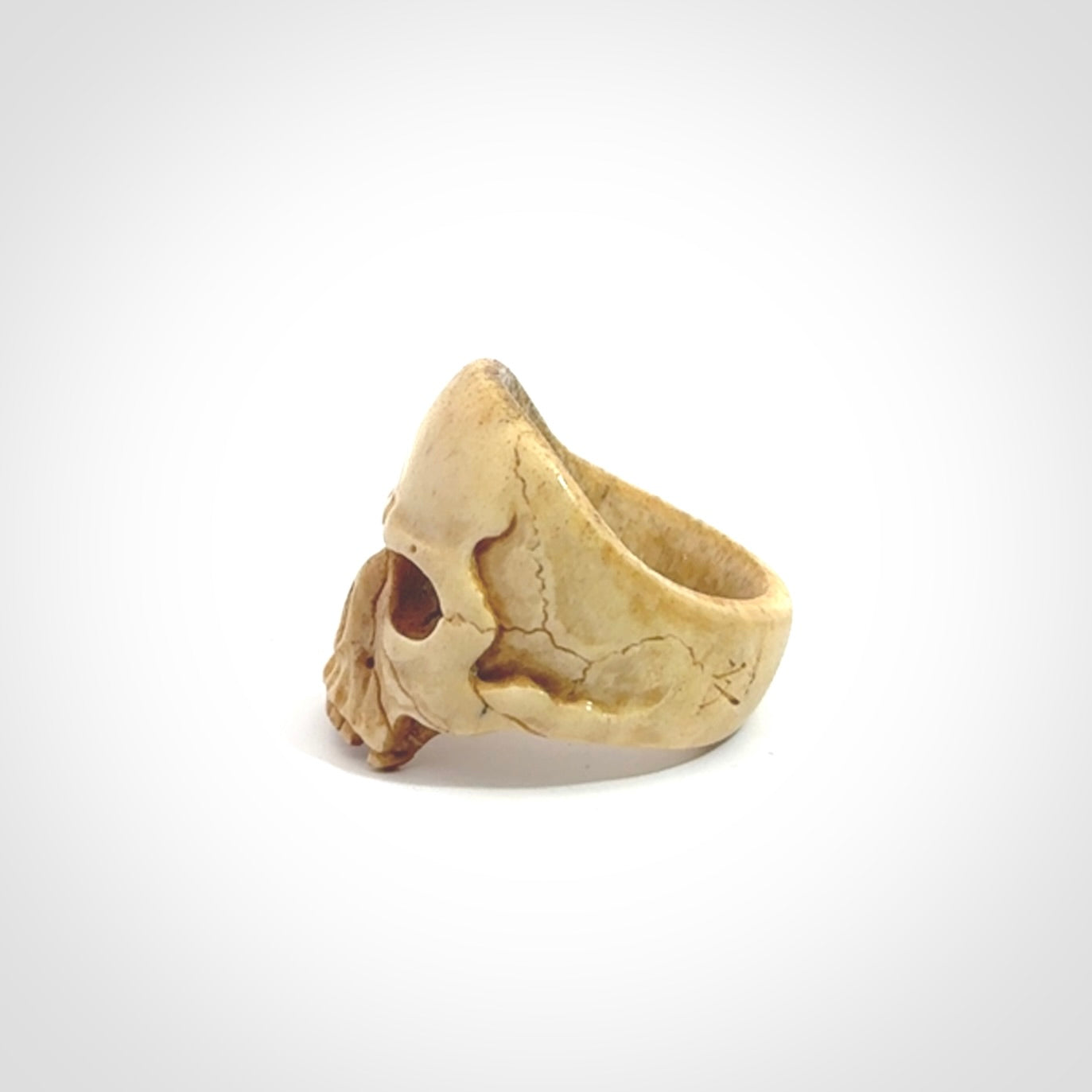 Hand carved skull ring. Made from Red Deer antler in New Zealand. Unique skull ring hand made from deer antler by master bone carver Fumio Noguchi. Spectacular collectable work of art, made to wear. One only ring, delivered to you at no extra cost with express courier.