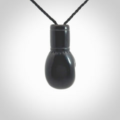 Hand carved boxing glove made from black jade. The cord is adjustable so that you can wear this where it suits you best. We ship these worldwide and the postage is included in the price.