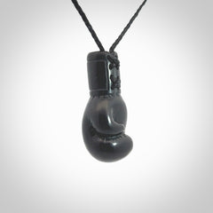 Hand carved boxing glove made from black jade. The cord is adjustable so that you can wear this where it suits you best. We ship these worldwide and the postage is included in the price.