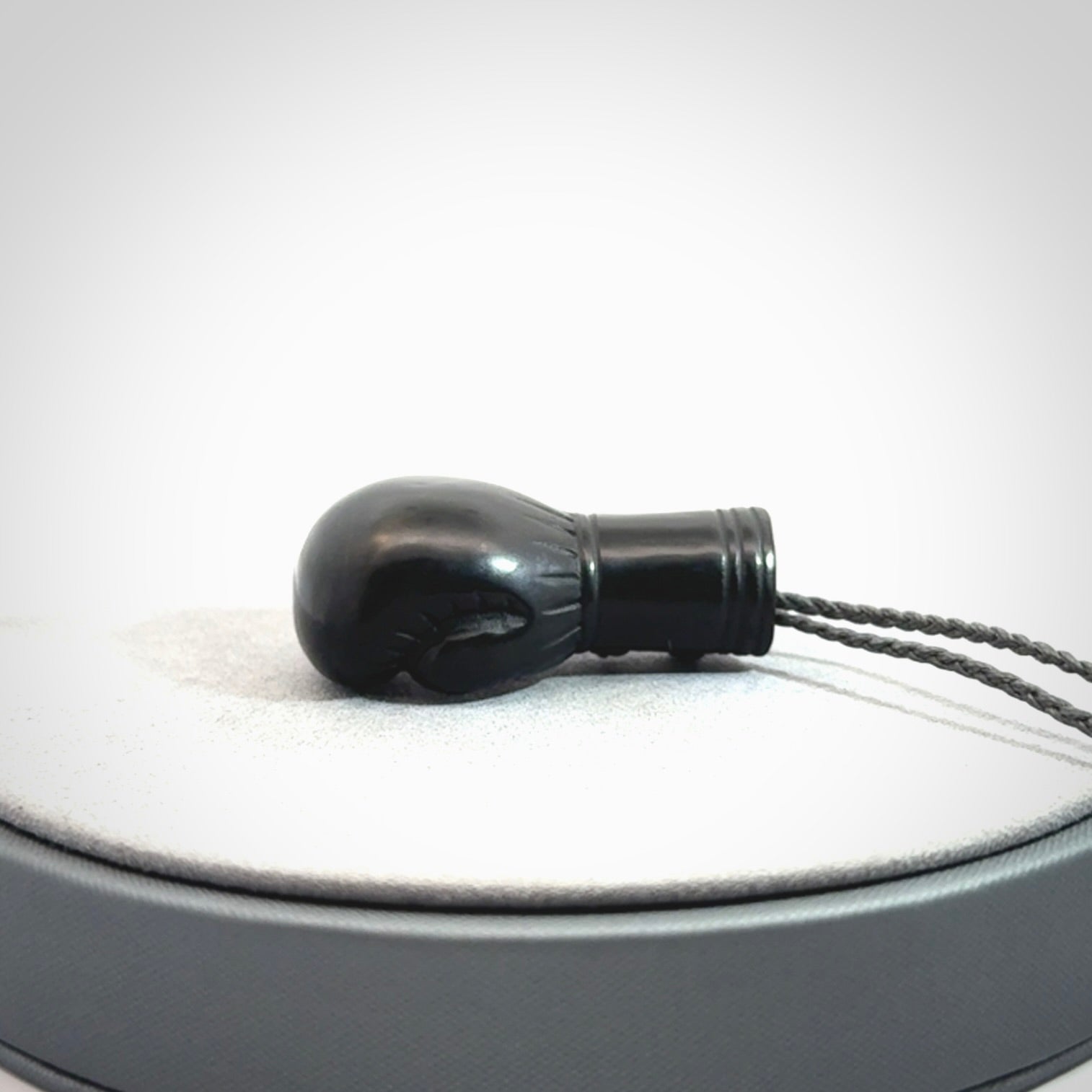Hand Carved Black Jade Boxing Glove Pendant.