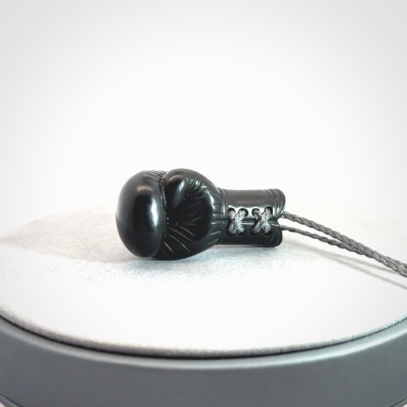Hand Carved Black Jade Boxing Glove Pendant.