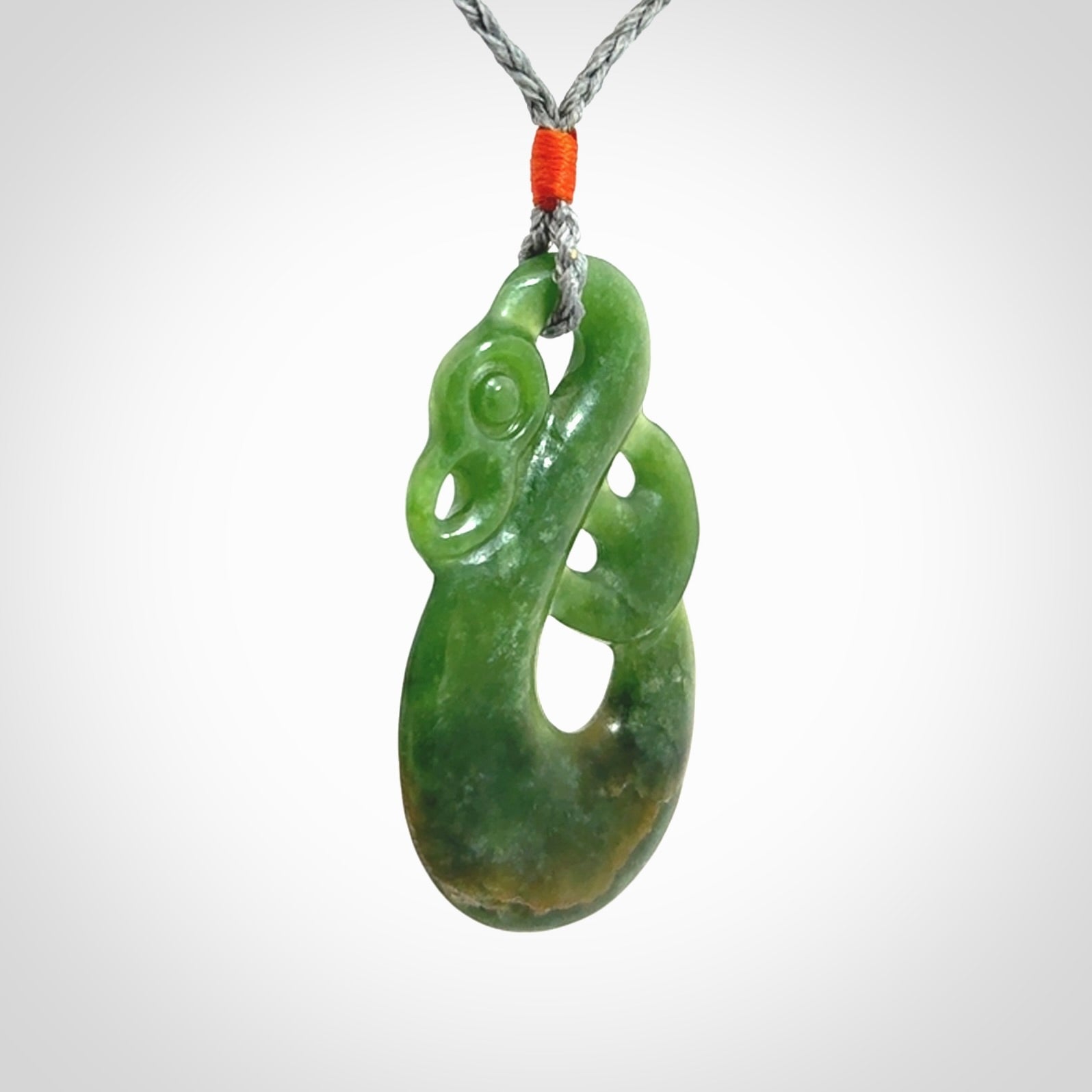 Hand carved New Zealand Jade manaia pendant. Hand made polished Manaia necklace for men and women.