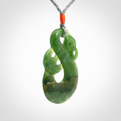 Hand carved New Zealand Jade manaia pendant. Hand made polished Manaia necklace for men and women.