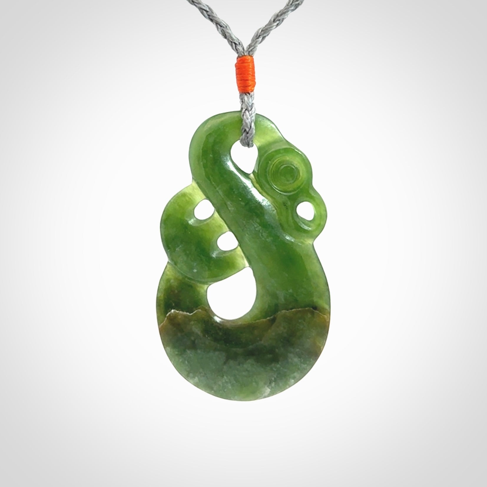 Hand carved New Zealand Jade manaia pendant. Hand made polished Manaia necklace for men and women.