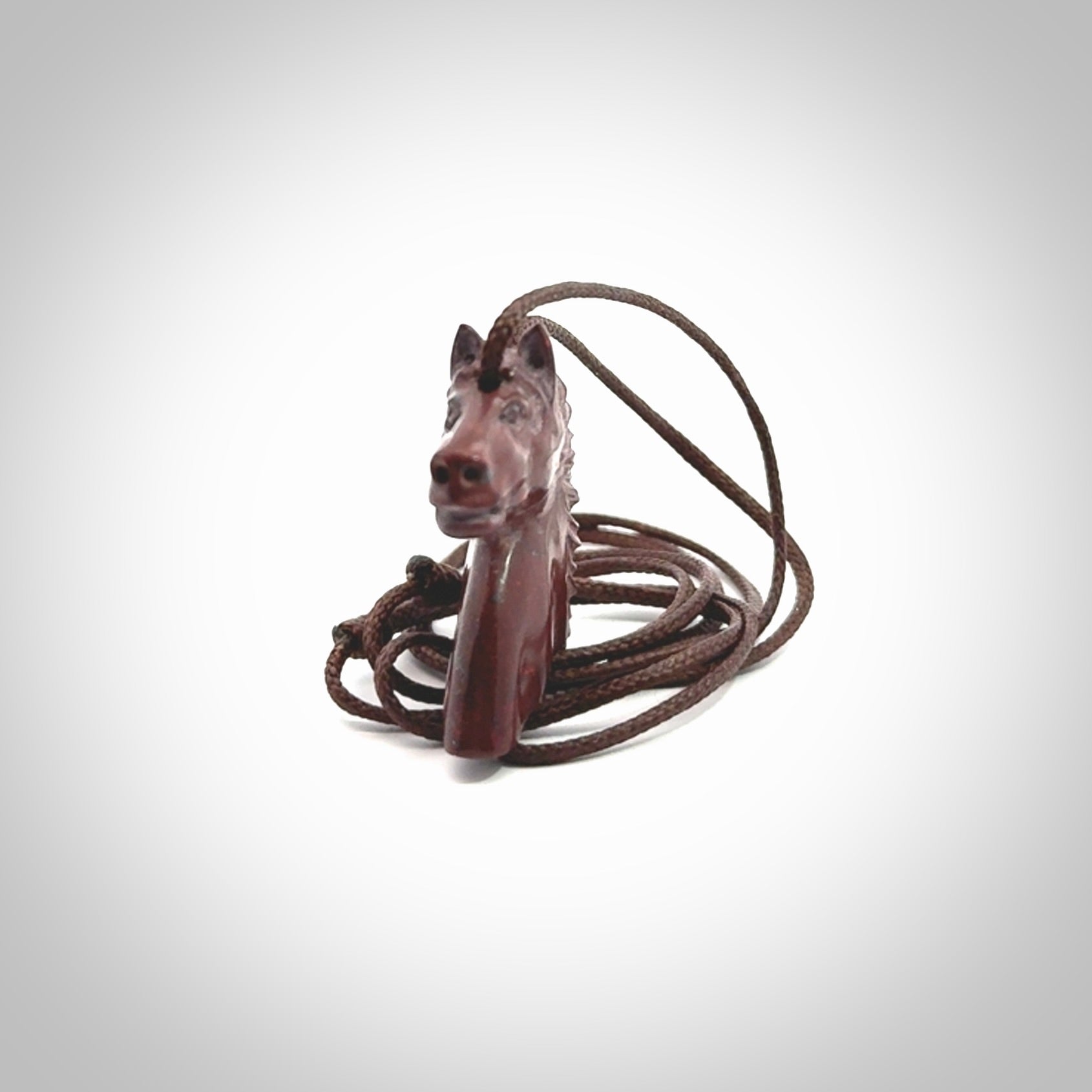 This medium sized horse pendant is made from Red Jasper Stone. We've hand carved this piece for all the horse lovers out there. Free postage worldwide. Red Jasper Stone horse head jewellery.