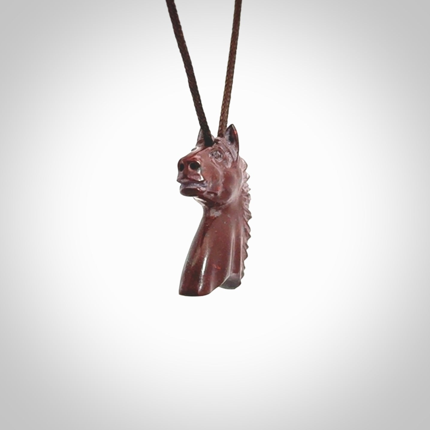 This medium sized horse pendant is made from Red Jasper Stone. We've hand carved this piece for all the horse lovers out there. Free postage worldwide. Red Jasper Stone horse head jewellery.