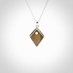Hand carved mammoth tusk necklace. Made by NZ Pacific and for sale online only. Original and authentic handcrafted jewellery.