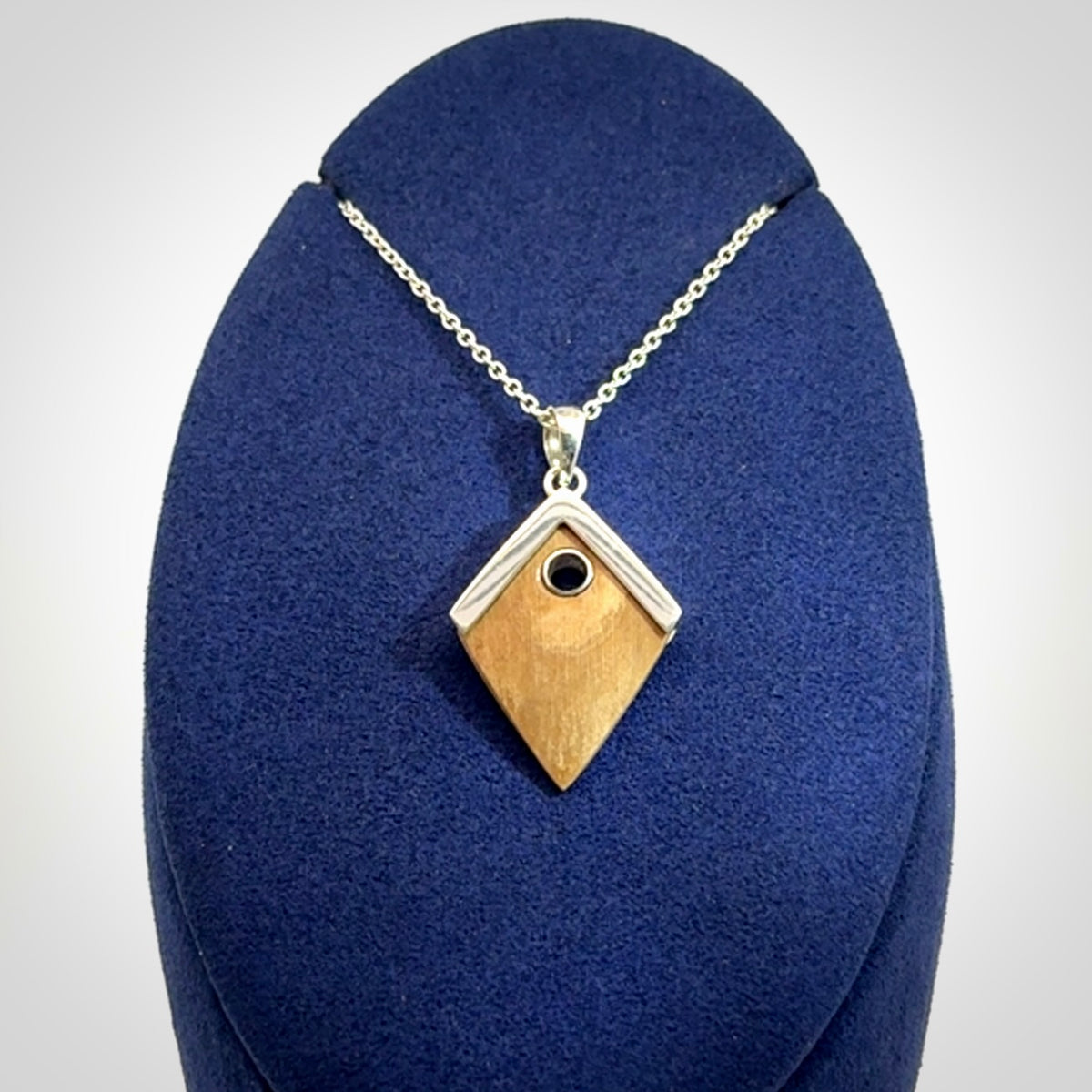 Hand carved mammoth tusk necklace. Made by NZ Pacific and for sale online only. Original and authentic handcrafted jewellery.