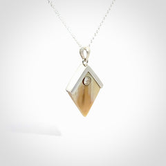 Hand carved mammoth tusk necklace. Made by NZ Pacific and for sale online only. Original and authentic handcrafted jewellery.