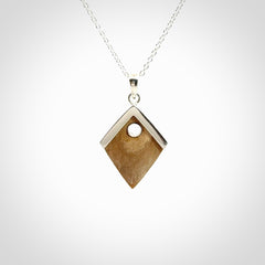 Hand carved mammoth tusk necklace. Made by NZ Pacific and for sale online only. Original and authentic handcrafted jewellery.