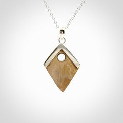 Hand carved mammoth tusk necklace. Made by NZ Pacific and for sale online only. Original and authentic handcrafted jewellery.