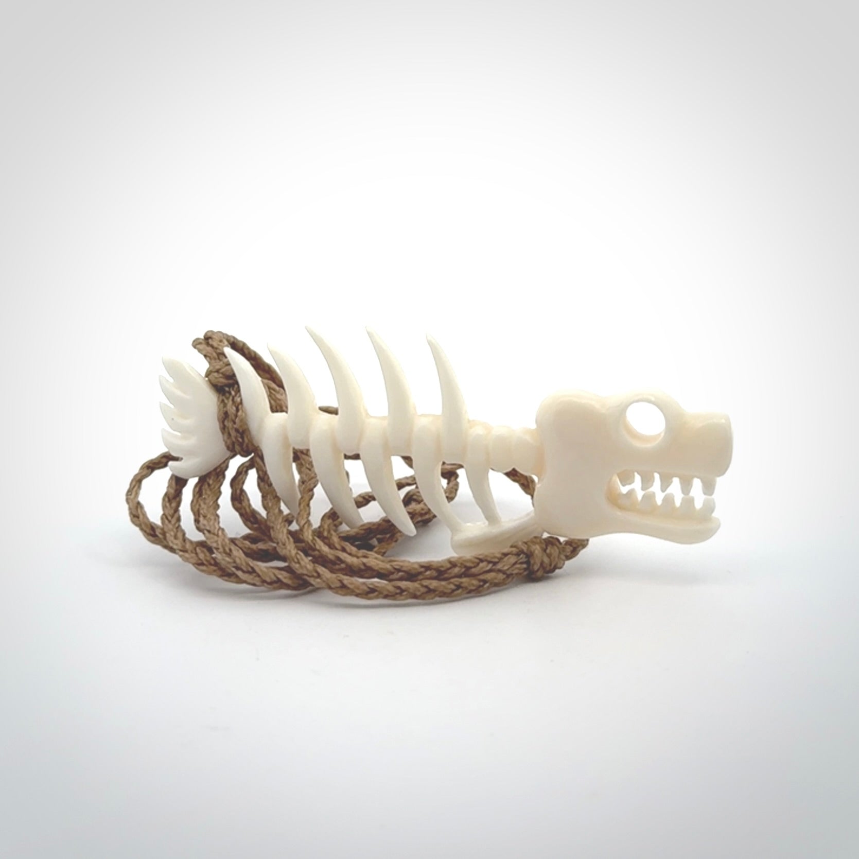 Hand carved bone fish skeleton pendant. Hand made bone fish necklace. Fish themed jewellery. Ocean themed pendant. One only necklace provided with adjustable cord and free delivery.