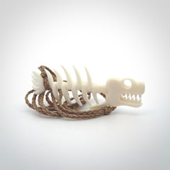 Hand carved bone fish skeleton pendant. Hand made bone fish necklace. Fish themed jewellery. Ocean themed pendant. One only necklace provided with adjustable cord and free delivery.