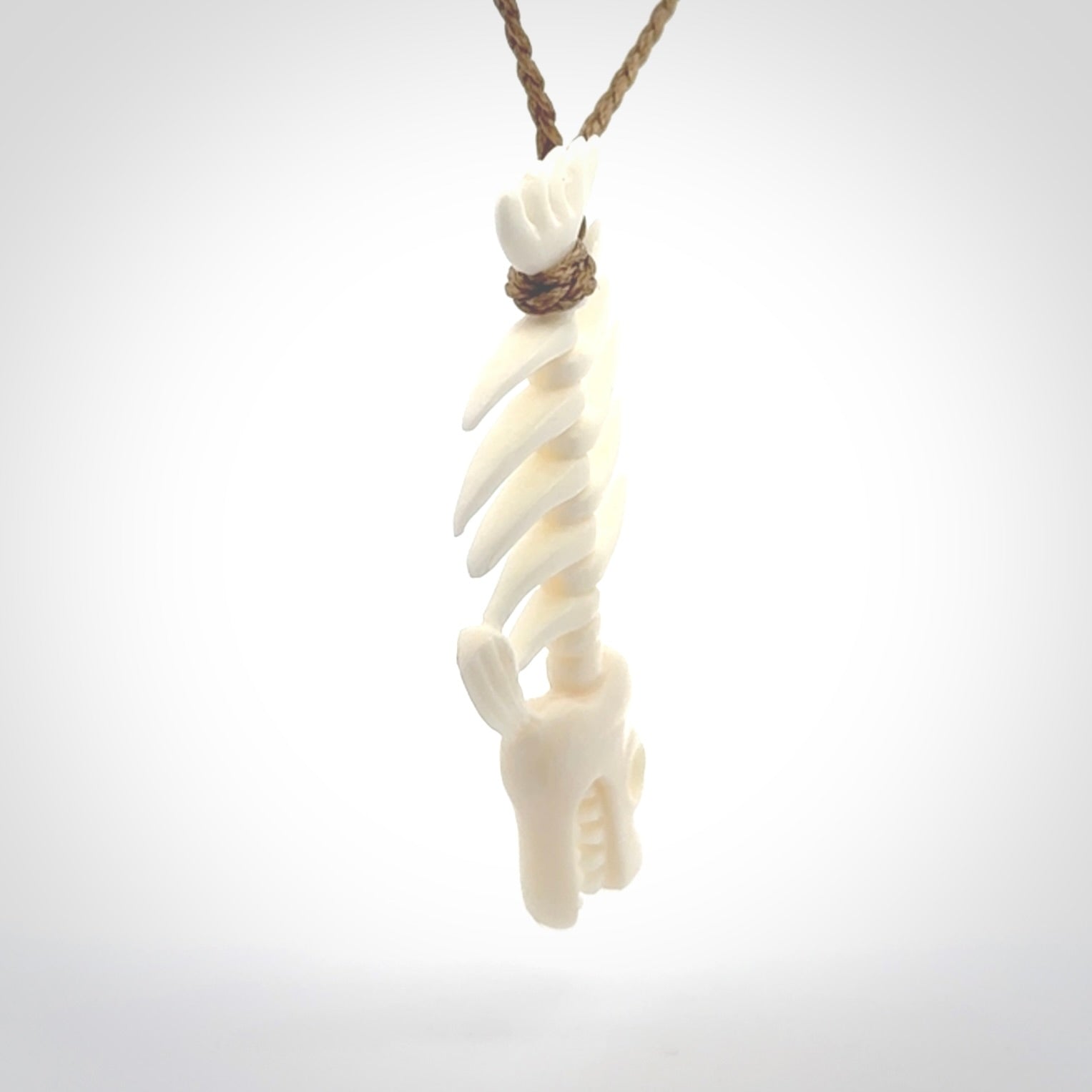 Hand carved bone fish skeleton pendant. Hand made bone fish necklace. Fish themed jewellery. Ocean themed pendant. One only necklace provided with adjustable cord and free delivery.