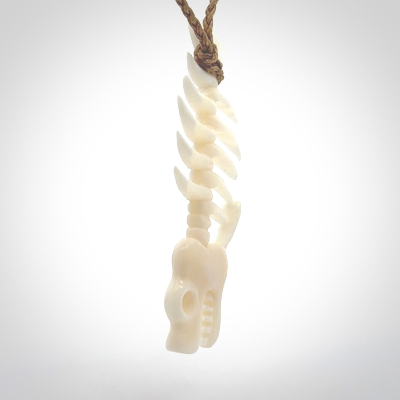 Hand carved bone fish skeleton pendant. Hand made bone fish necklace. Fish themed jewellery. Ocean themed pendant. One only necklace provided with adjustable cord and free delivery.