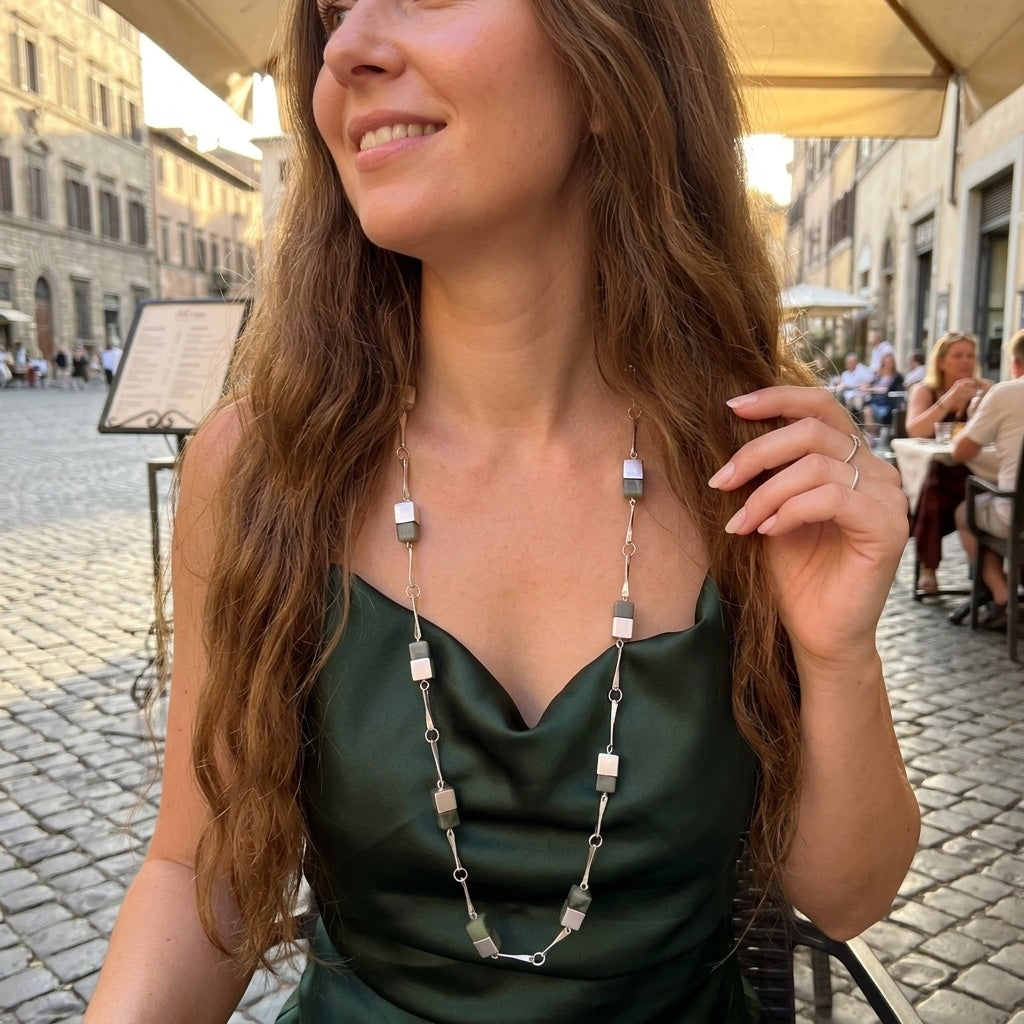 Woman wearing jade and silver necklace