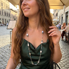 Woman wearing jade and silver necklace