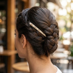 Woman wearing bone hair pin