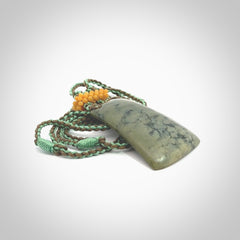 Hand carved New Zealand Jade pendant with adjustable cord. This piece is a stand out work of creativity and skill and we love Jen Hung's creations. Unique, one only, New Zealand made necklace for sale. Free shipping worldwide.