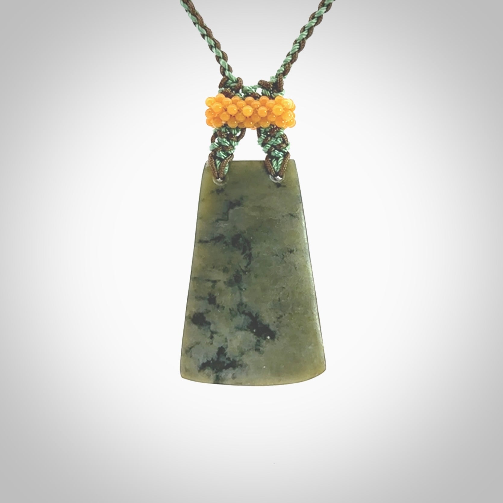 Hand carved New Zealand Jade pendant with adjustable cord. This piece is a stand out work of creativity and skill and we love Jen Hung's creations. Unique, one only, New Zealand made necklace for sale. Free shipping worldwide.