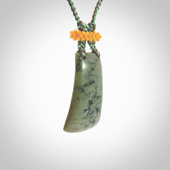 Hand carved New Zealand Jade pendant with adjustable cord. This piece is a stand out work of creativity and skill and we love Jen Hung's creations. Unique, one only, New Zealand made necklace for sale. Free shipping worldwide.