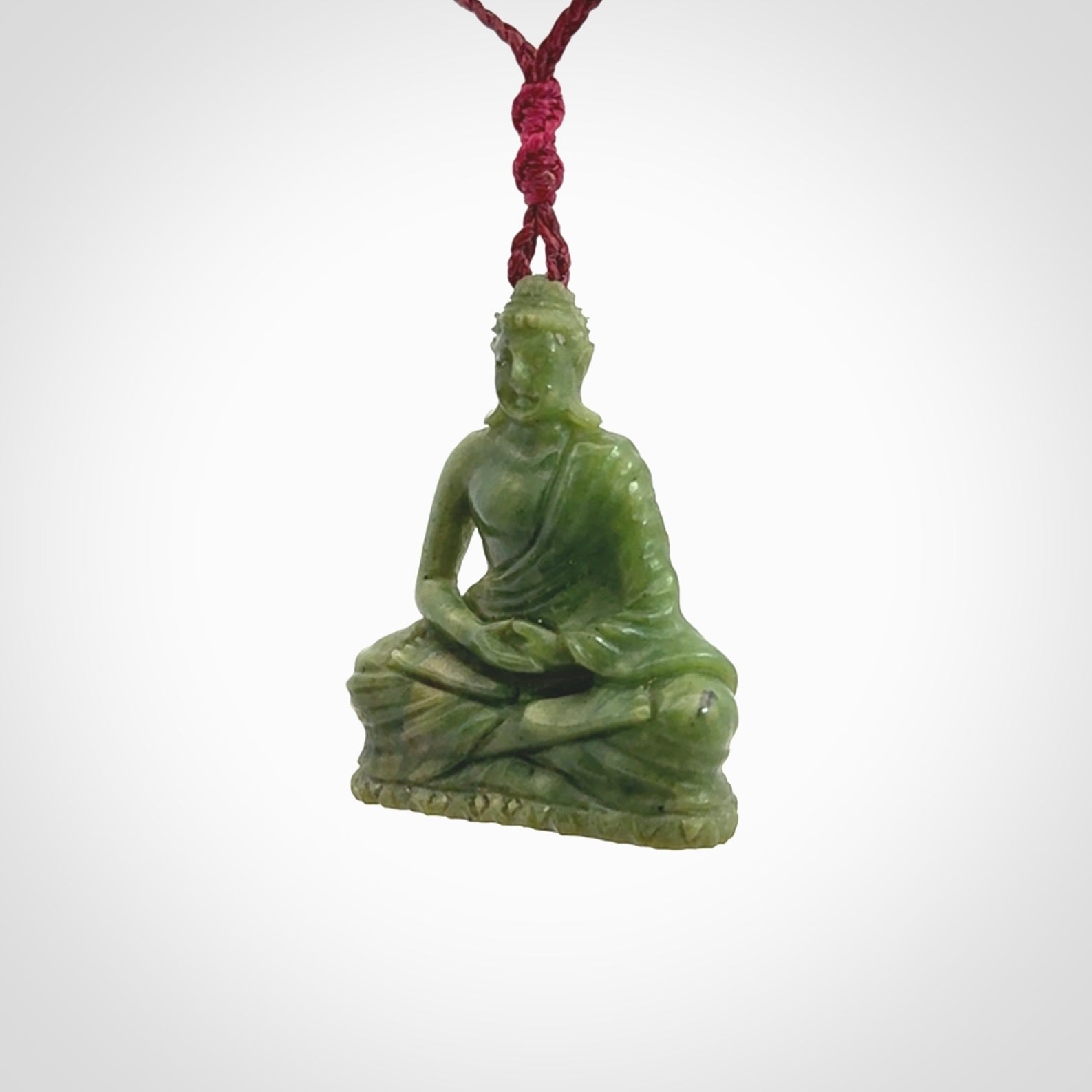 Hand carved jade buddha pendant