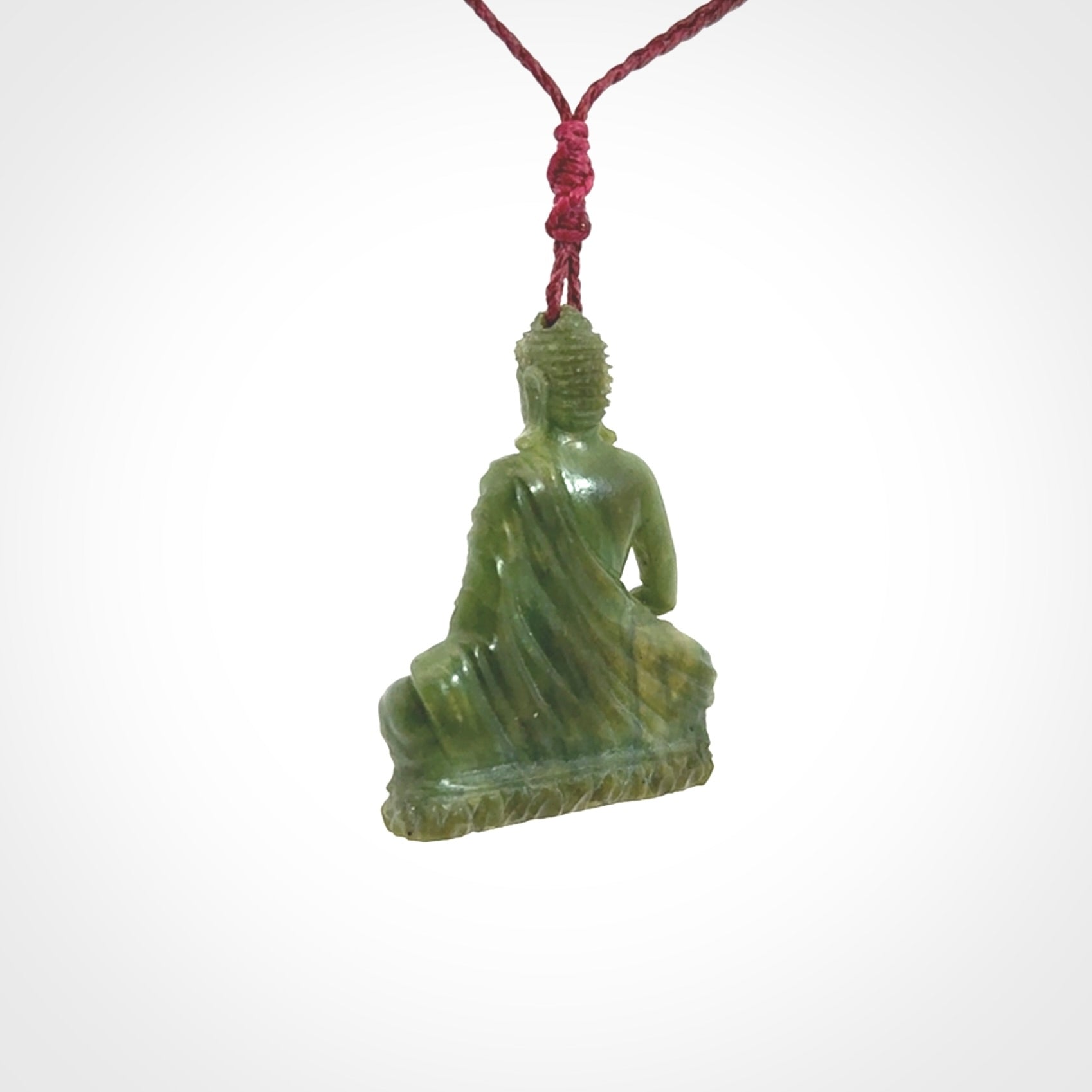 Hand carved jade buddha pendant
