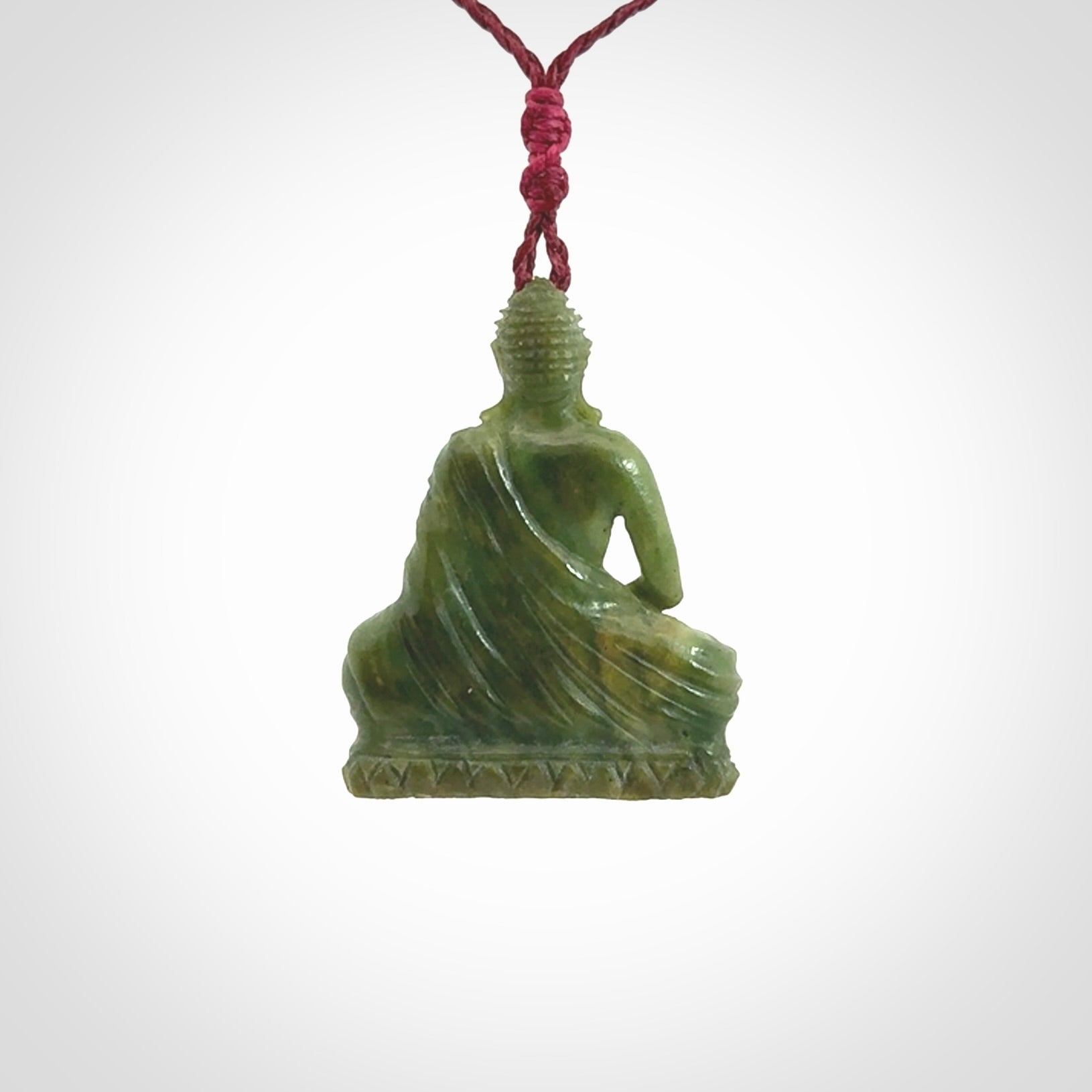 Hand carved jade buddha pendant