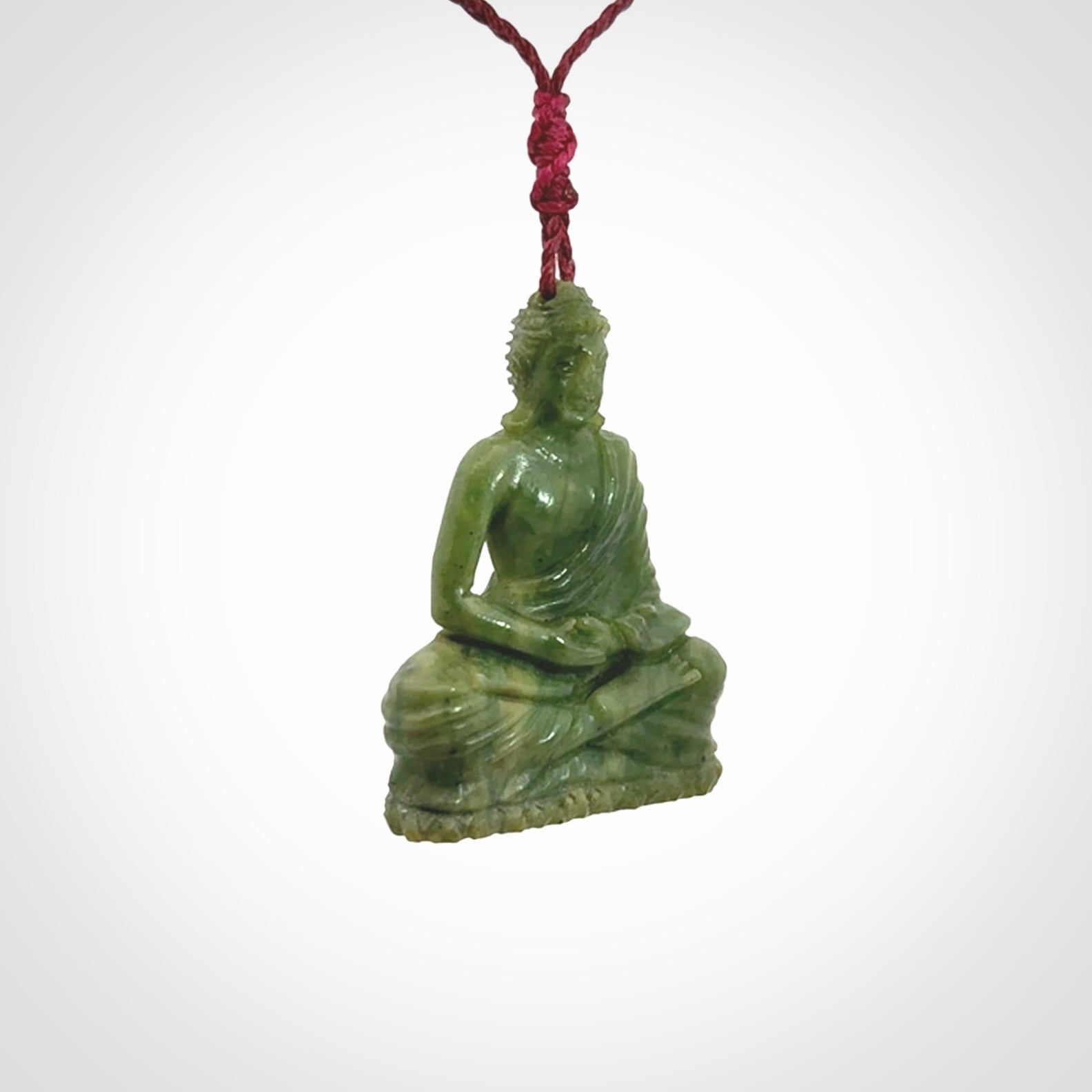 Hand carved jade buddha pendant