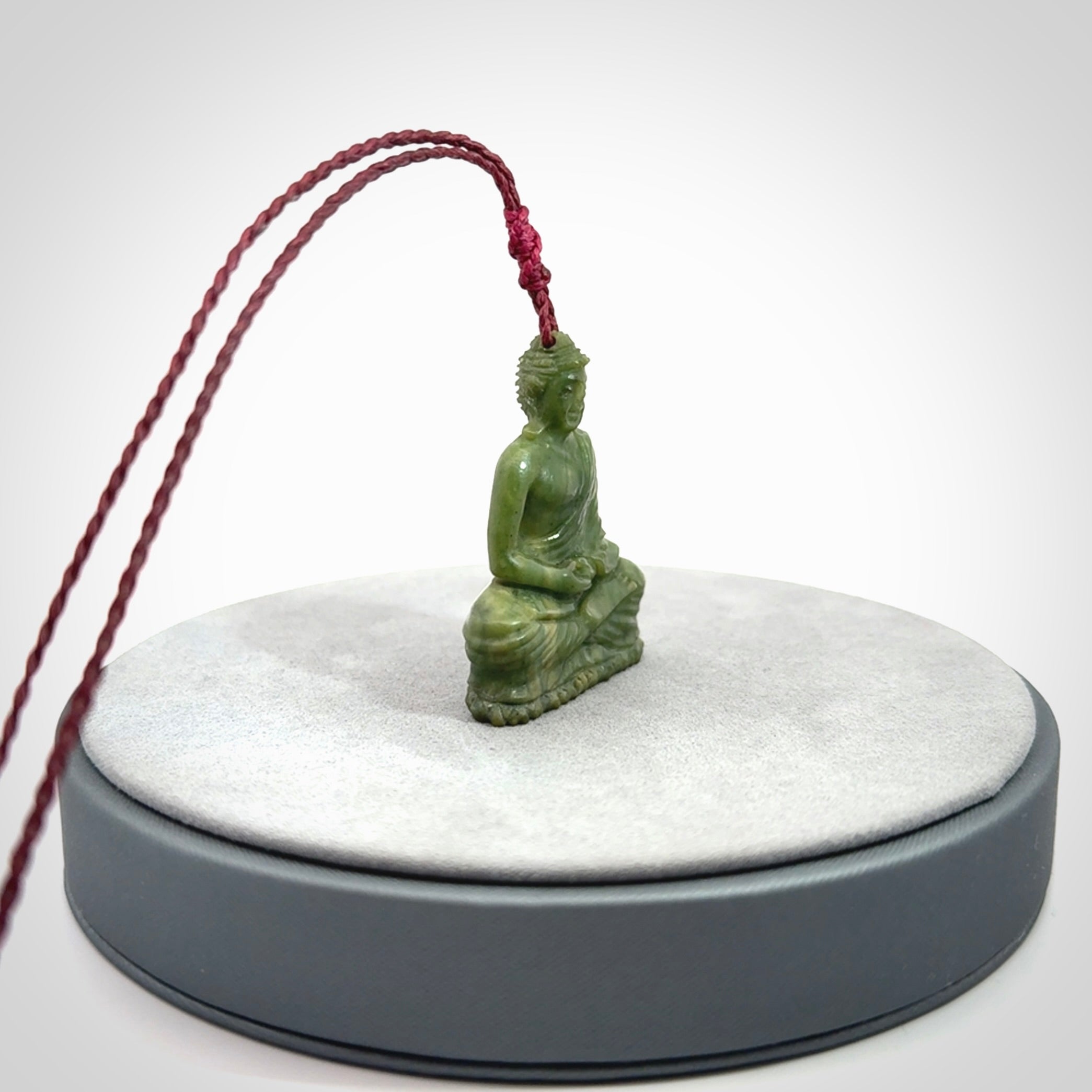 Hand carved jade buddha pendant