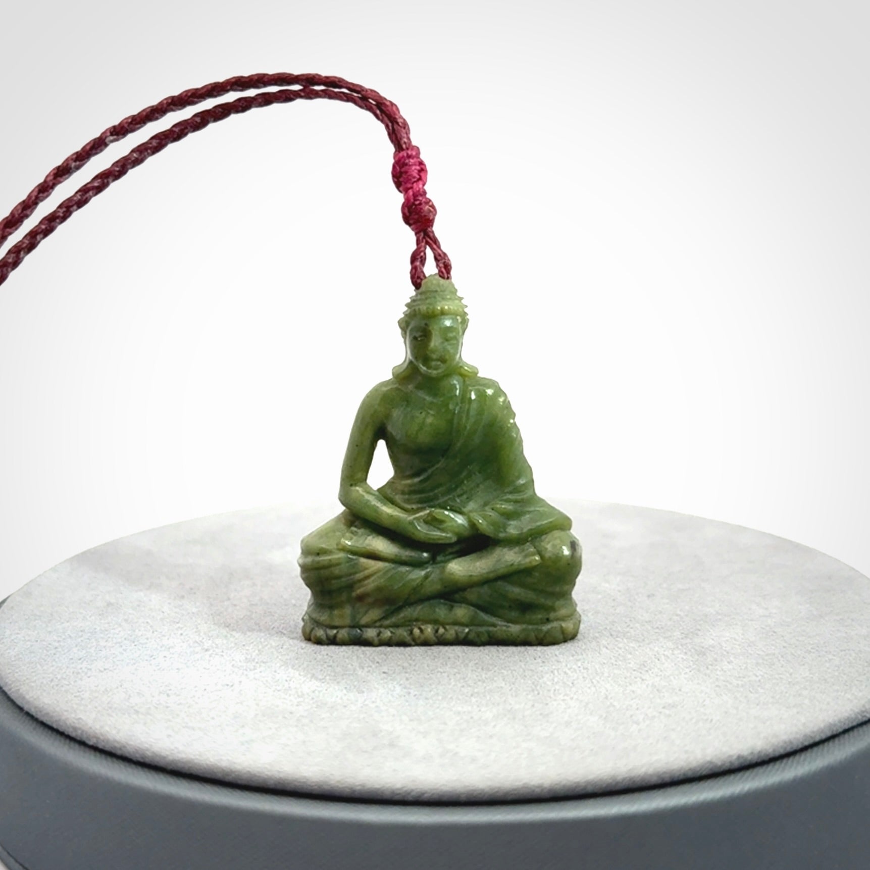 Hand carved jade buddha pendant