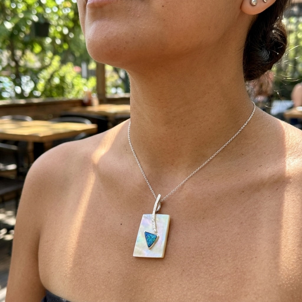 Woman wearing mother of pearl pendant