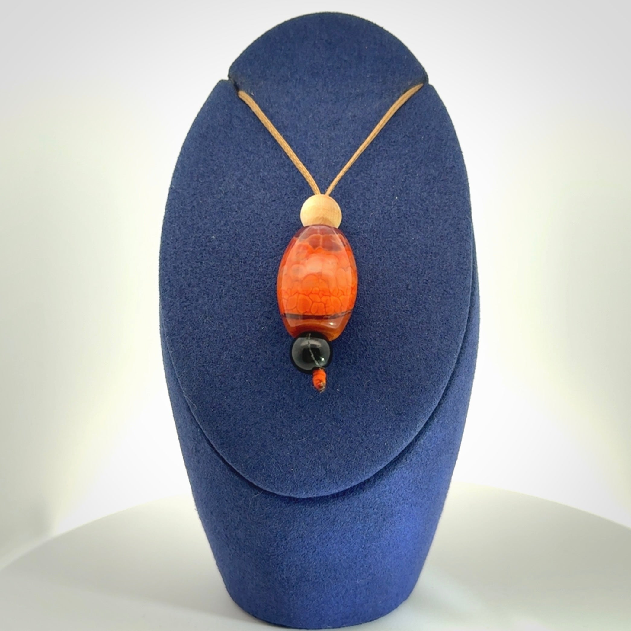 Snakeskin Agate contemporary drop pendant with black jade and woolly mammoth tusk beads. Hand carved for you by NZ Pacific.