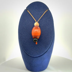 Snakeskin Agate contemporary drop pendant with black jade and woolly mammoth tusk beads. Hand carved for you by NZ Pacific.