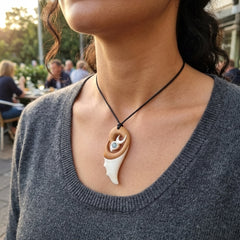 Woman wearing bone pendant