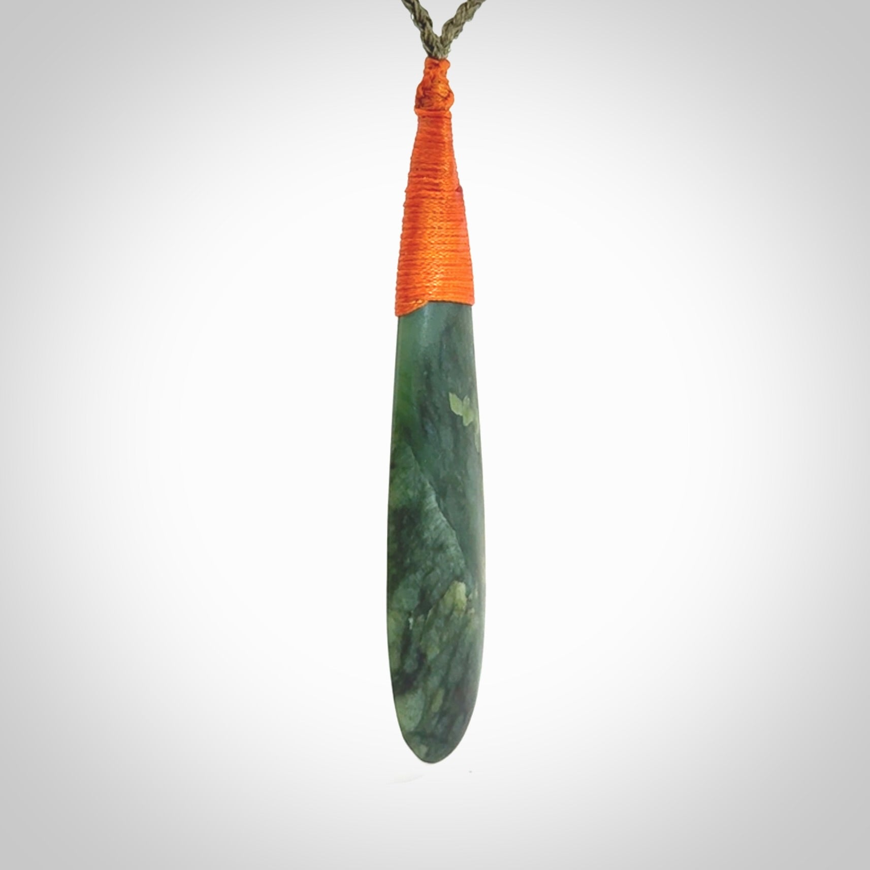 New Zealand flower jade drop pendant. Hand carved in New Zealand by NZ Pacific. Large New Zealand Jade roimata drop necklace. Drop pendant representing healing, comfort and compassion. Unisex pendants for lovers of Jade art to wear.