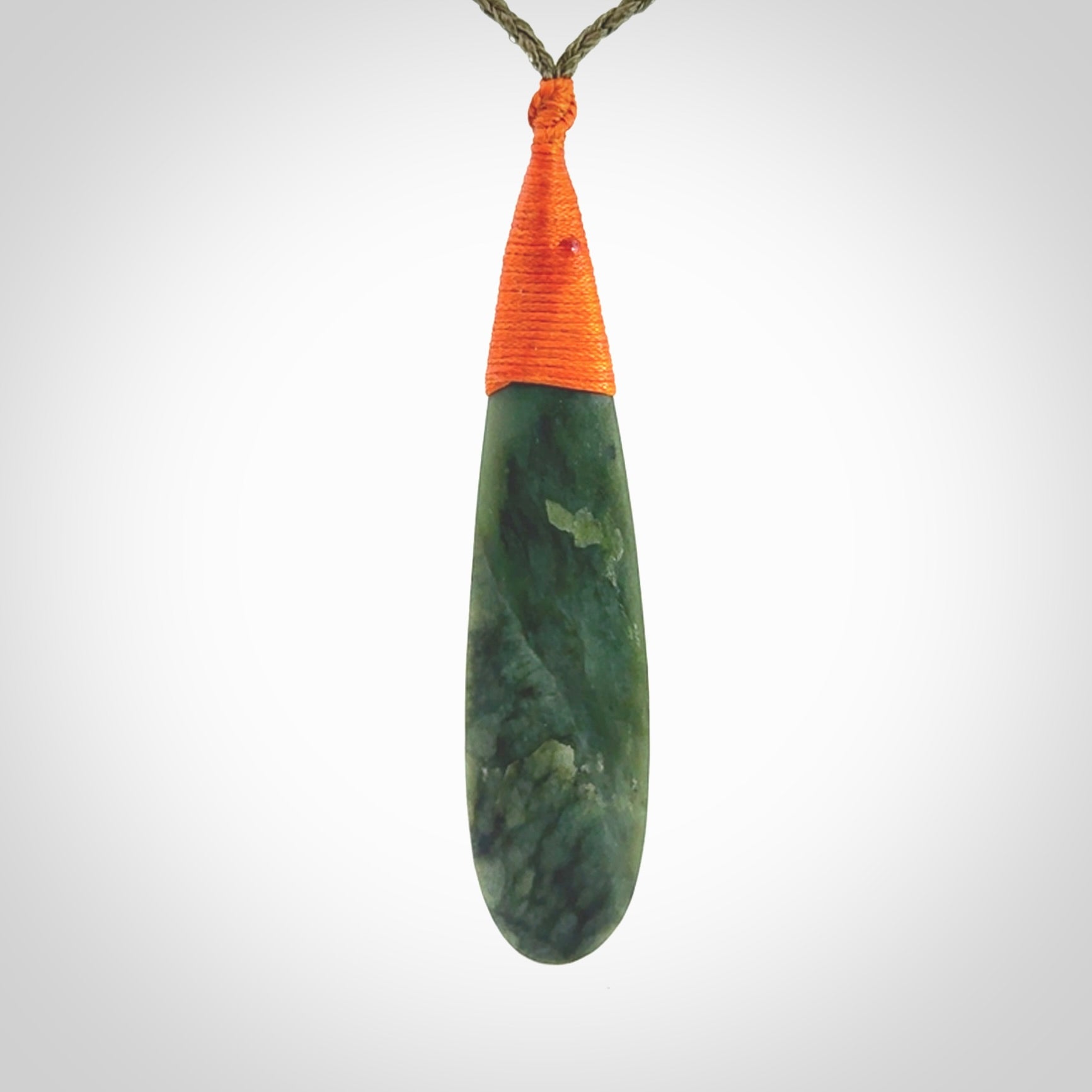 New Zealand flower jade drop pendant. Hand carved in New Zealand by NZ Pacific. Large New Zealand Jade roimata drop necklace. Drop pendant representing healing, comfort and compassion. Unisex pendants for lovers of Jade art to wear.