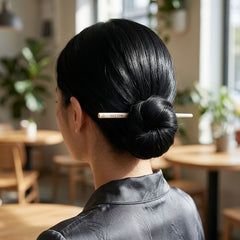 Woman wearing Bone hair pin