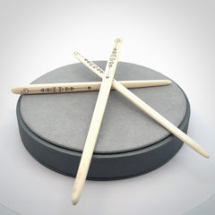 Hand carved bone hair pin with double sided koru design.