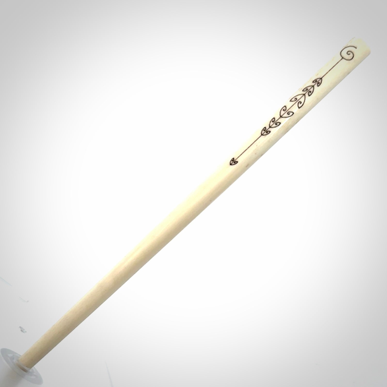 Hand carved bone hair pin with double sided koru design.