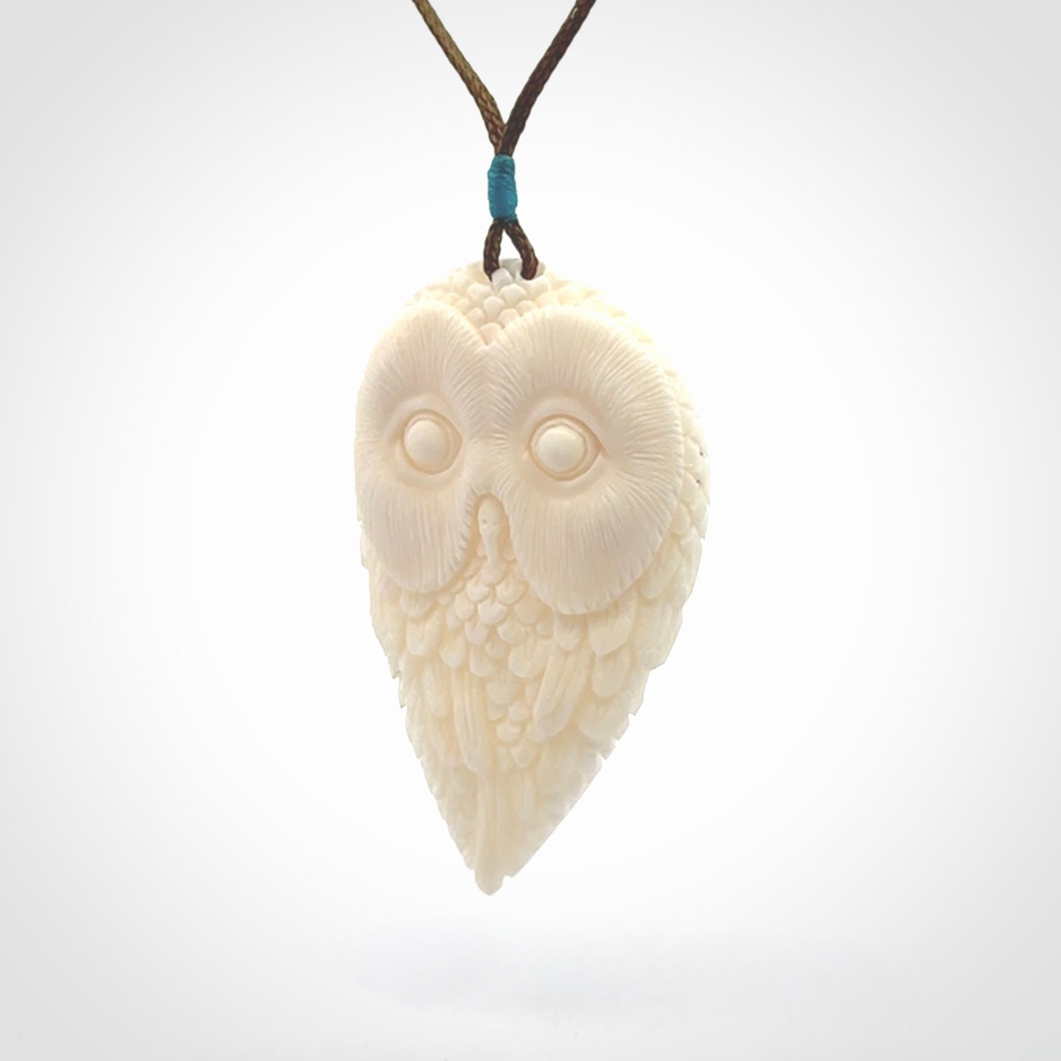 A Owl design carving, hand made for us from Bone. This pendant is provided with an adjustable cord.
