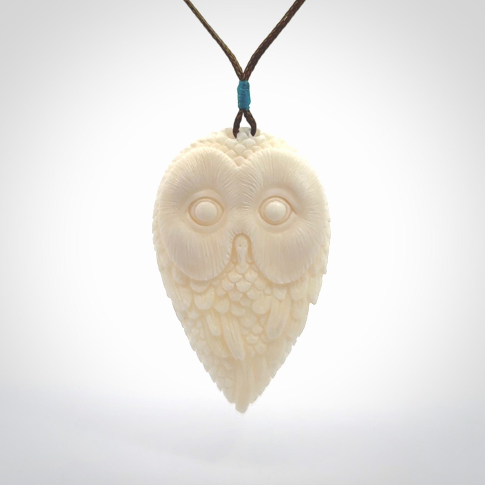A Owl design carving, hand made for us from Bone. This pendant is provided with an adjustable cord.