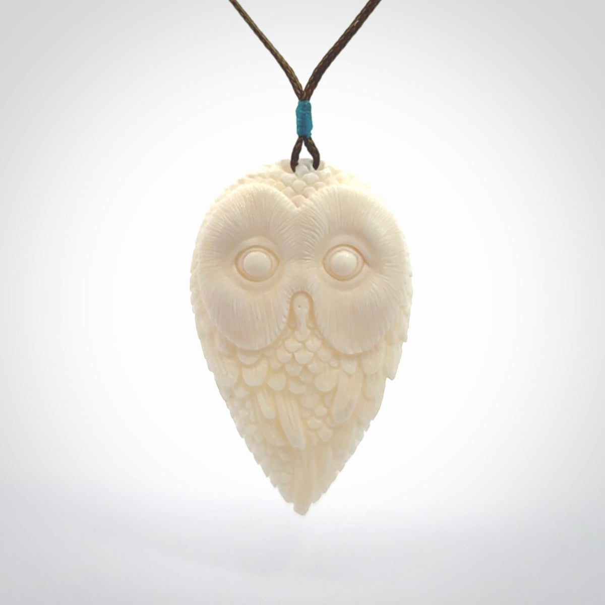 A Owl design carving, hand made for us from Bone. This pendant is provided with an adjustable cord.