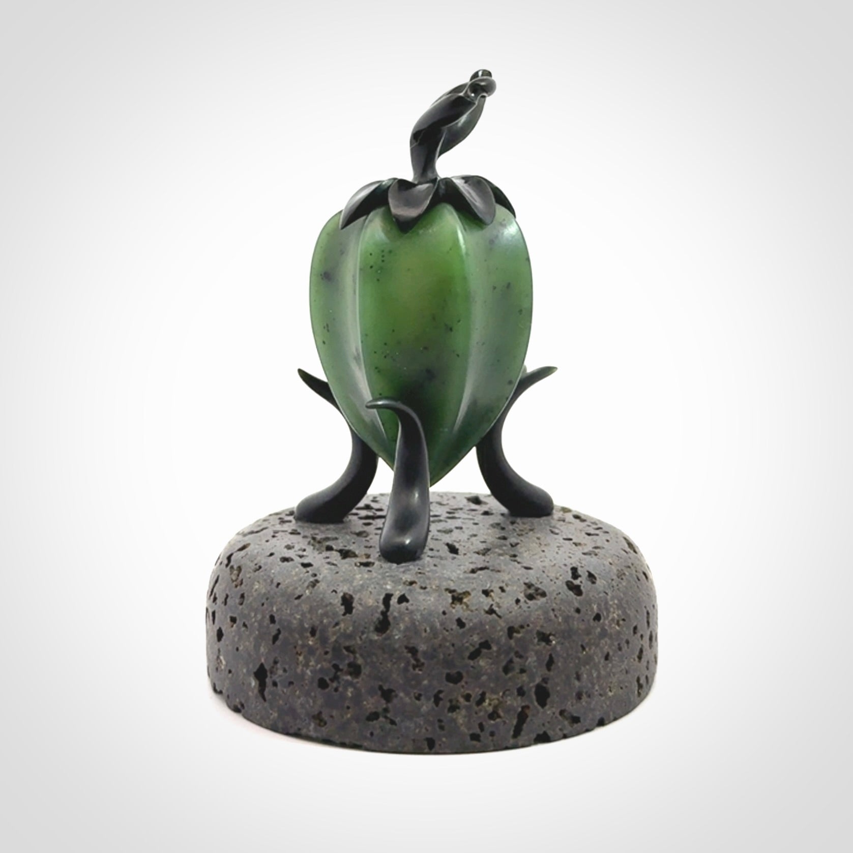 Hand carved Gooseberry sculpture crafted in Black Jade, British Columbian Jade with Basalt stone stand. One only Gooseberry sculpture with lid that encloses a bell.