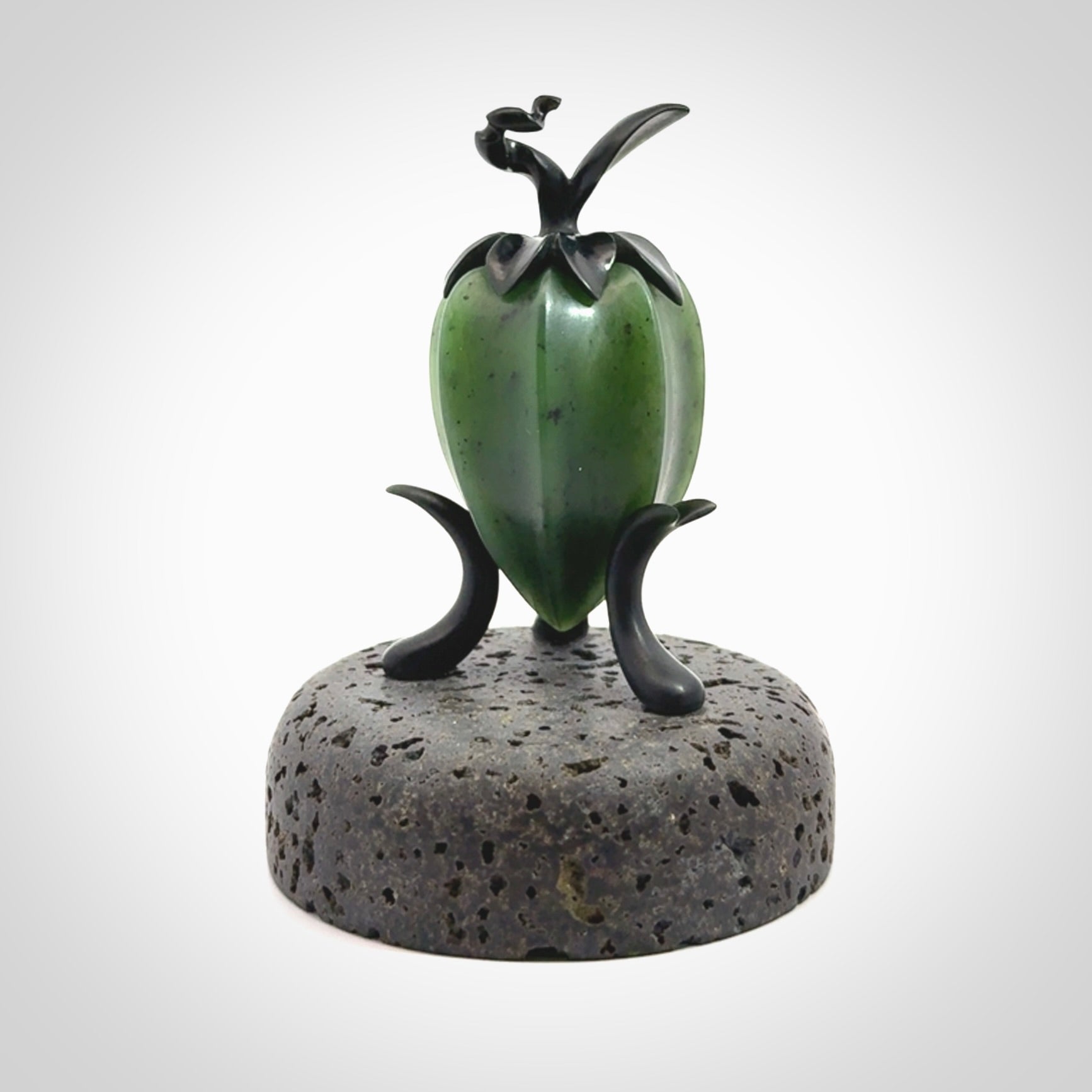 Hand carved Gooseberry sculpture crafted in Black Jade, British Columbian Jade with Basalt stone stand. One only Gooseberry sculpture with lid that encloses a bell.