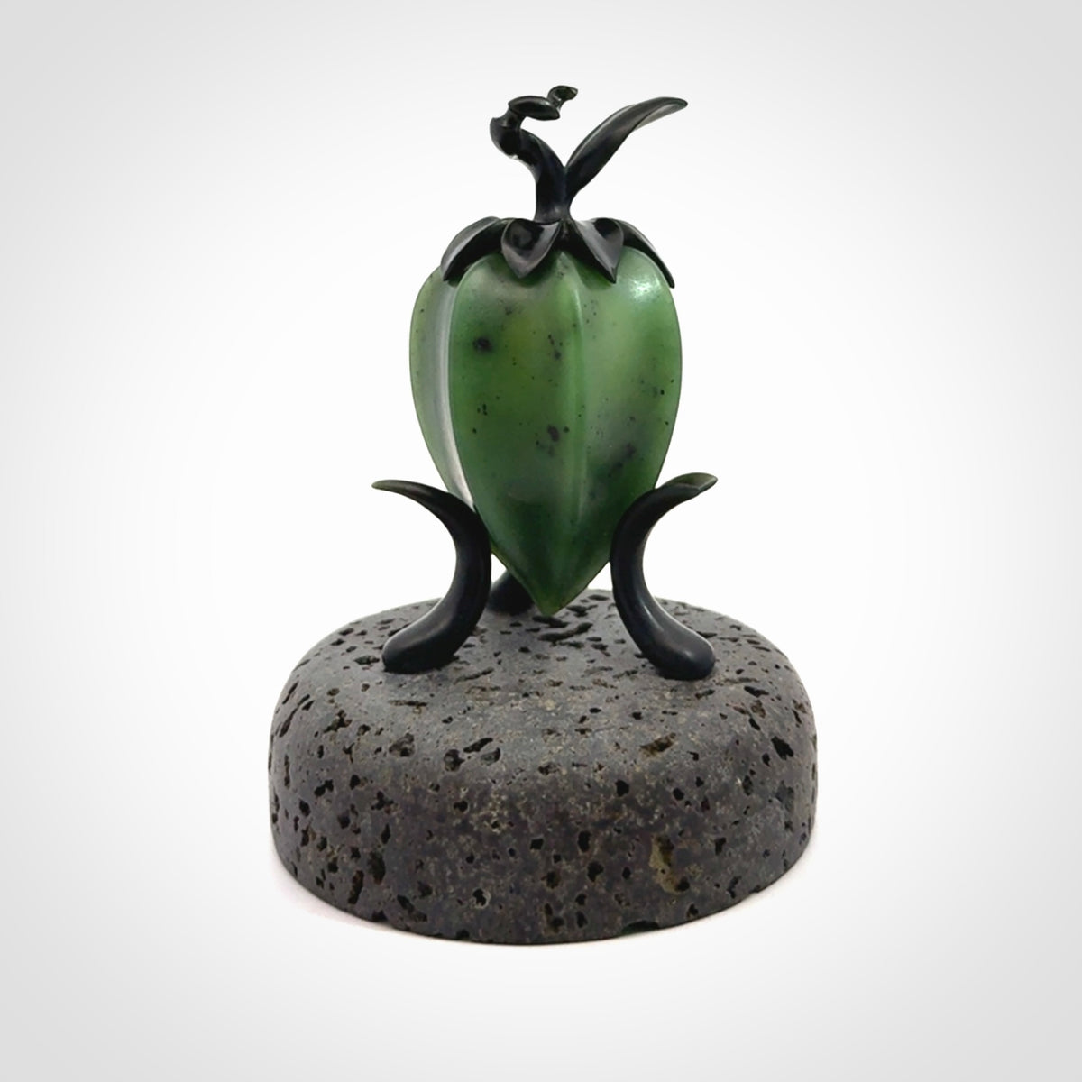 Hand carved Gooseberry sculpture crafted in Black Jade, British Columbian Jade with Basalt stone stand. One only Gooseberry sculpture with lid that encloses a bell.