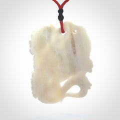 Hand Carved Bone dragon hatchling pendant