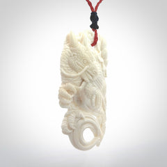 Hand Carved Bone dragon hatchling pendant
